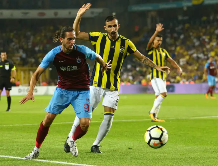 Mehmet Topal (R) of Fenerbahce and Yusuf Yazici of Trabzonspor  during the Turkey Superlig match between Fenerbahce and Trabzonspor at Sukru Saracoglu Stadium in Istanbul , Turkey on August 20 , 2017.
Final Scores : Fenerbahce 2 - Trabzonspor 2