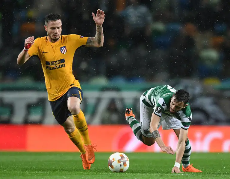 Sporting's Portuguese midfielder Bruno Fernandes (R) vies with Atletico's Spanish midfielder Saul Niguez during the UEFA Europa League quarter-final second leg football match between Sporting CP and Club Atletico de Madrid at the Jose Alvalade stadium in Lisbon on April 12, 2018. / AFP PHOTO / FRANCISCO LEONG