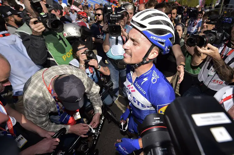 French Julian Alaphilippe of Quick-Step Floors celebrates winning the 82nd edition of the men's race of 'La Fleche Wallonne', a one day cycling race that covers 198.5 kilometres from Seraing to Huy on April 18, 2018.  / AFP PHOTO / BELGA AND Belga / YORICK JANSENS / Belgium OUT