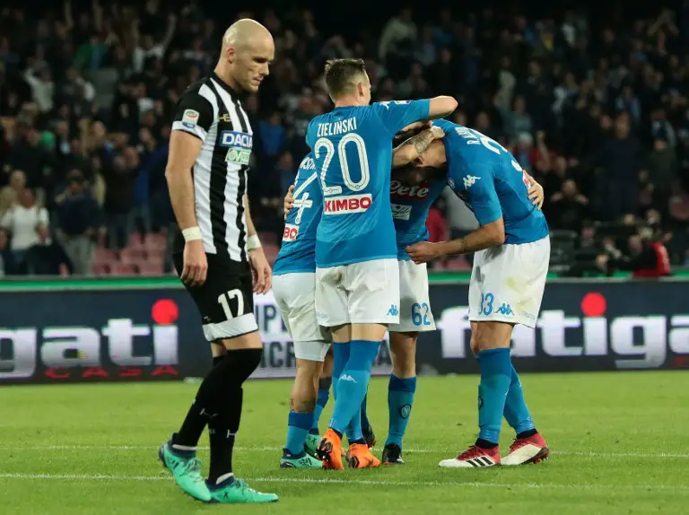 Napoli's players celebrate during the Italian Serie A football match SSC Napoli vs Udinese Calcio on April 18, 2018 at the San Paolo Stadium in Naples. / AFP PHOTO / CARLO HERMANN