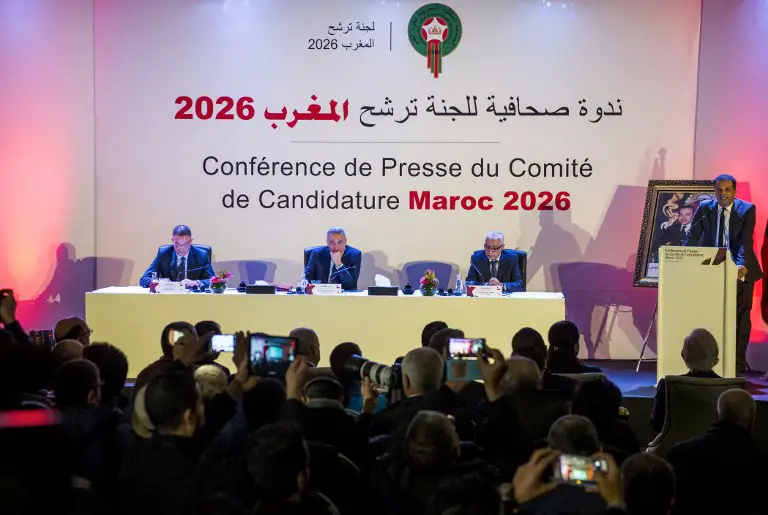 Fouzi Lekjaa (L), President of the Royal Moroccan Football Federation (FRMF), Moulay Hafid Elalamy (C), chairman of the Moroccan Committee bidding for the 2026 World Cup, and Moroccan Youth and Sport Minister Rachid Talbi Alami (2nd-R) give a press conference in Casablanca on January 23, 2018, presenting their country's pitch to host the 2026 competition. / AFP PHOTO / FADEL SENNA