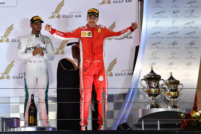 Race winner Sebastian Vettel (GER) Ferrari celebrates on the podium