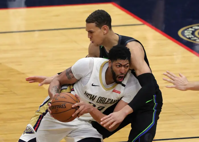 New Orleans Pelicans forward Anthony Davis (23) drives to the basket against Dallas Mavericks center Dwight Powell (7) at the Smoothie King Center in New Orleans, LA.