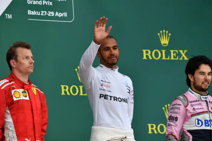 Kimi Raikkonen (FIN) Ferrari, Lewis Hamilton (GBR) Mercedes-AMG F1 and Sergio Perez (MEX) Force India celebrate on the podium at Formula One World Championship, Rd4, Azerbaijan Grand Prix, Race, Baku City Circuit, Baku, Azerbaijan, Sunday 29 April 2018.