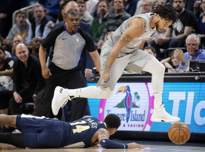 April 11, 2018 - Minneapolis, MN, USA - The Minnesota Timberwolves' Derrick Rose steals the ball from the Denver Nuggets' Gary Harris (14) in the second quarter on Wednesday, April 11, 2018, at the Target Center in Minneapolis.