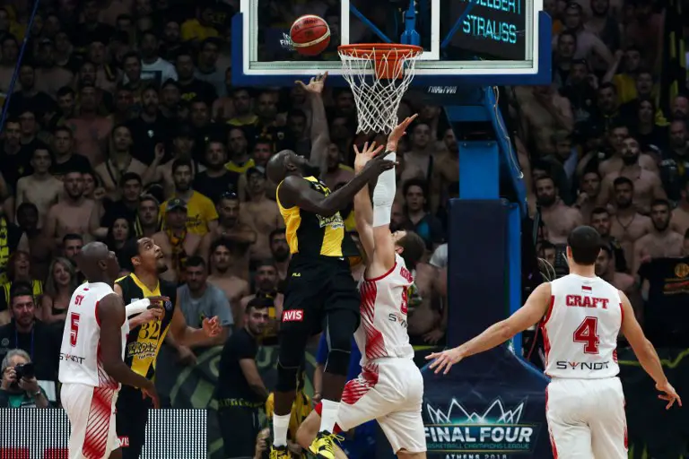 AS Monaco's Elemedin Kikanovic (2ndR) vies with AEK Athens  Delroy James (2ndL) during the final four Champions League basketball 3rd place game between Riesen Ludwigsburg and Ucam Murcia at the OAKA stadium, in Athens on April 6, 2018. / AFP PHOTO / ANDREAS PAPAKONSTANTINOU