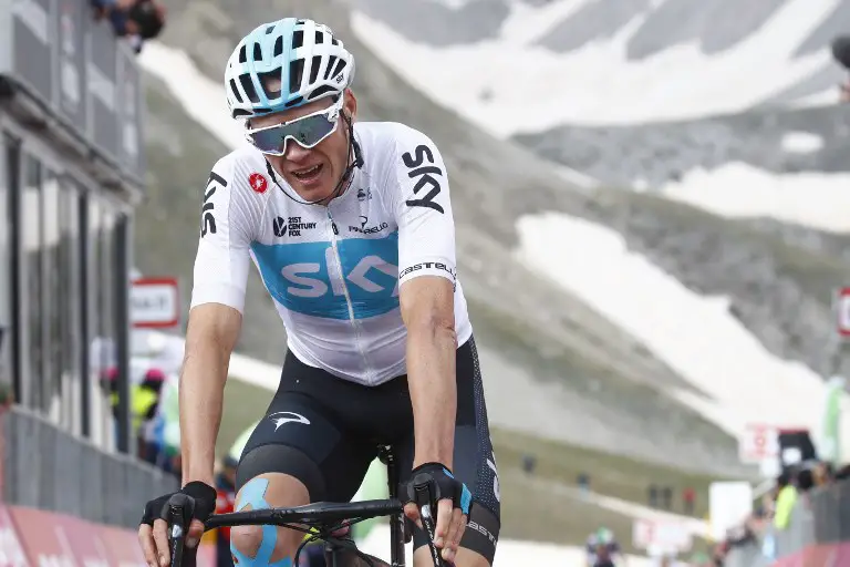 Britain's rider of team Sky Christopher Froome reacts after crossing the finish line of the 9th stage between Pesco Sannita and the Gran Sasso during the 101st Giro d'Italia, Tour of Italy cycling race, on May 13, 2018. 
Mitchelton rider Yates crossed just ahead of France's Thibaut Pinto and Colombian Esteban Chaves on the finished line at 2,135 metres altitude. The race included a gruelling 26.5km final climb to Campo Imperatore, where Benito Mussolini was imprisoned in 1943.
 / AFP PHOTO / Luk Benies