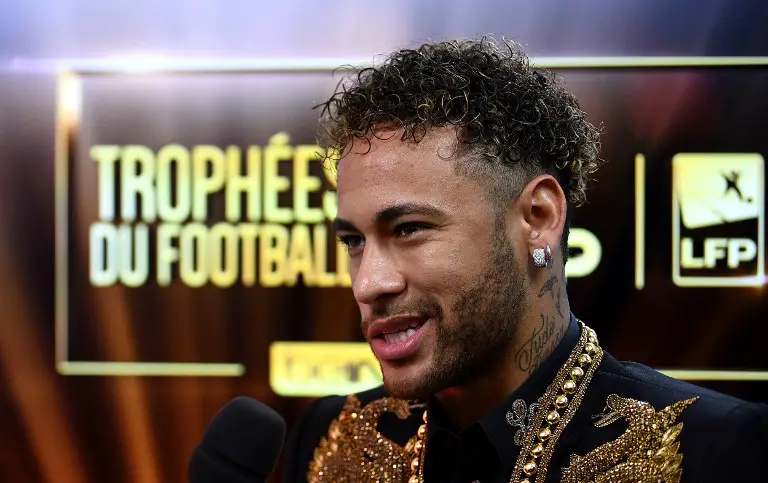 Paris Saint-Germain's Brazilian forward Neymar answers journalists questions before a TV show on May 13, 2018 in Paris, as part of the 27th edition of the UNFP (French National Professional Football players Union) trophy ceremony.  / AFP PHOTO / FRANCK FIFE