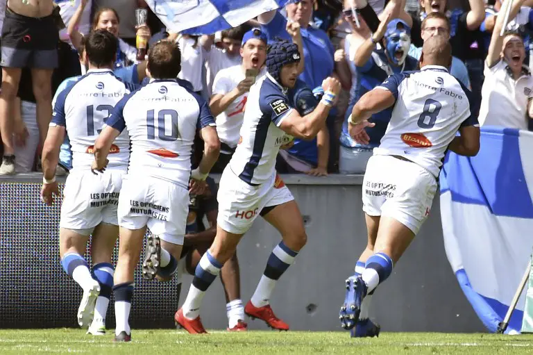 Castres' French winger Armand Batlle celebrates after scoring a try during the French Top 14 rugby union match Toulouse against Castres on May 19, 2018 at the Ernest Wallon Stadium in Toulouse, southern France. / AFP PHOTO / PASCAL PAVANI