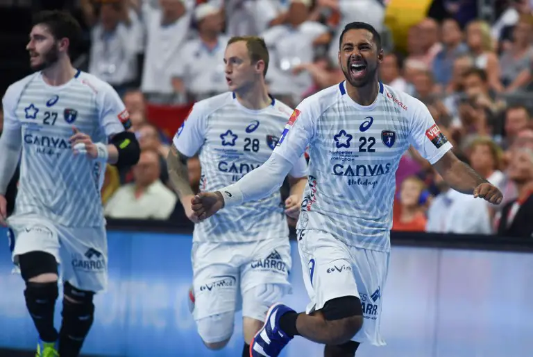 Montpellier's Melvyn Richardson (L) reacts during the semi final match HC Vardar against Montpellier HB at the EHF Pokal men's Champions League Final Four competition on May 26, 2018 in Cologne, western Germany.  / AFP PHOTO / Patrik STOLLARZ