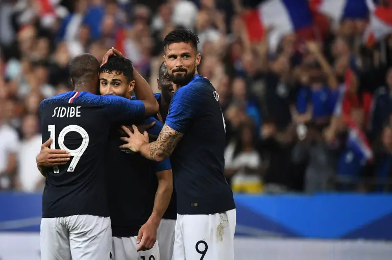 French forward Nabil Fekir (C) celebrates with teammates after scoring a goal during the friendly football match between France and Ireland at the Stade de France stadium, in Saint-Denis, on the outskirts of Paris, on May 28, 2018. / AFP PHOTO / FRANCK FIFE