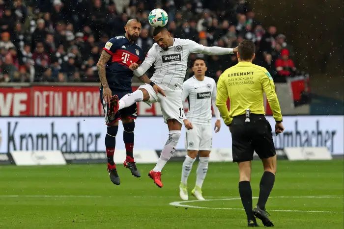Kevin Prince Boateng Frankfurt in the header duel with Arturo Vidal Muenchen