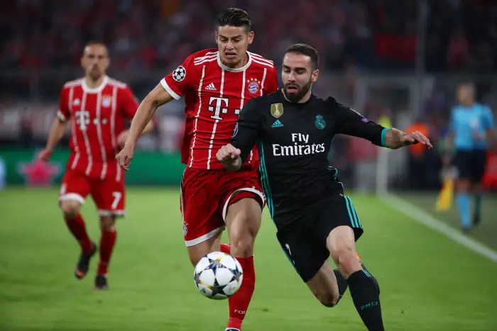 Soccer Football - Champions League Semi Final First Leg - Bayern Munich vs Real Madrid - Allianz Arena, Munich, Germany - April 25, 2018   Bayern Munich's James Rodriguez in action with Real Madrid's Dani Carvajal