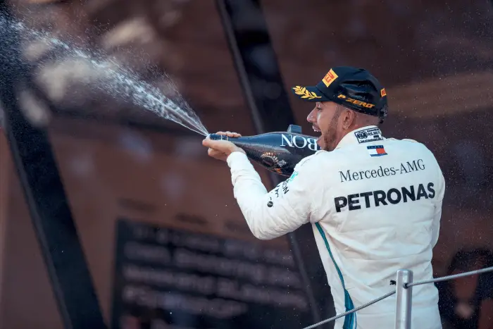 Race winner Lewis Hamilton (GBR) Mercedes-AMG F1 celebrates on the podium with the champagne at Formula One World Championship, Rd5, Spanish Grand Prix, Race, Barcelona, Spain, Sunday 13 May 2018.