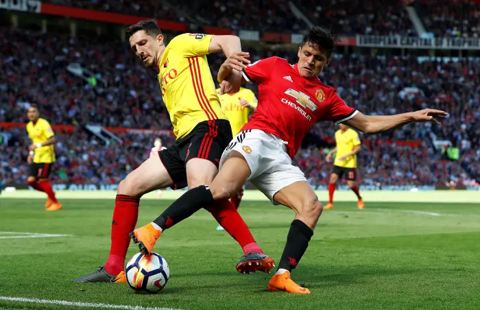 Soccer Football - Premier League - Manchester United vs Watford - Old Trafford, Manchester, Britain - May 13, 2018   Watford's Craig Cathcart in action with Manchester United's Alexis Sanchez