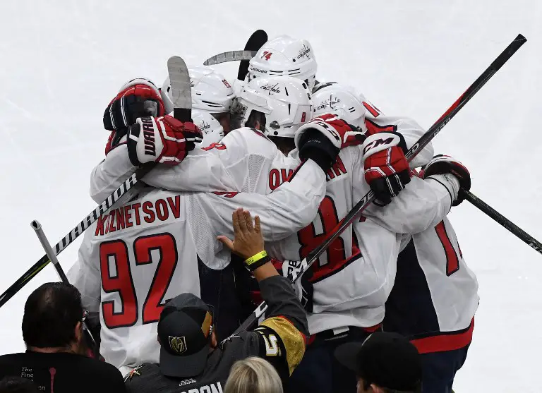 LAS VEGAS, NV - JUNE 07: The Washington Capitals celebrate after Alex Ovechkin #8 scored a second-period, power-play goal against the Vegas Golden Knights in Game Five of the 2018 NHL Stanley Cup Final at T-Mobile Arena on June 7, 2018 in Las Vegas, Nevada. The Capitals defeated the Golden Knights 4-3.   Ethan Miller/Getty Images/AFP