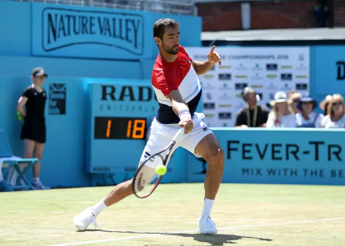 22nd June 2018, Queens Club, London, England; The Fever Tree Tennis Championships; Marin Cilic (CRO) with a forehand shot to Querrey