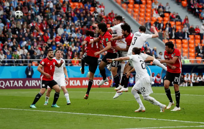 Uruguay's Jose Gimenez scores their first goal