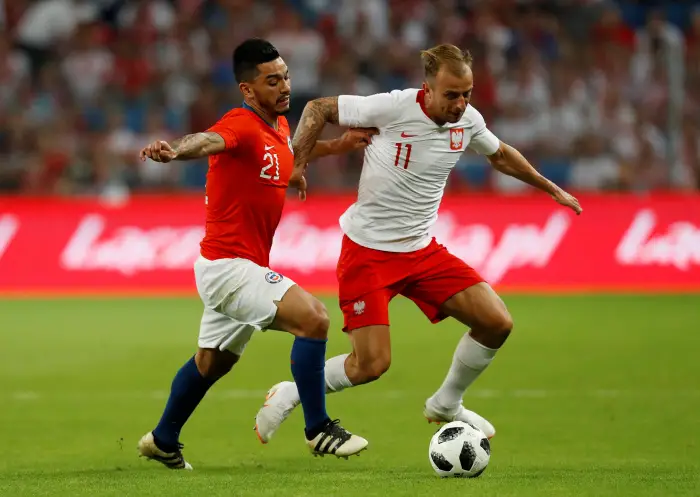 Soccer Football - International Friendly - Poland vs Chile - INEA Stadion, Poznan, Poland - June 8, 2018   Poland's Kamil Grosicki in action with ChileÄôs Lorenzo Reyes