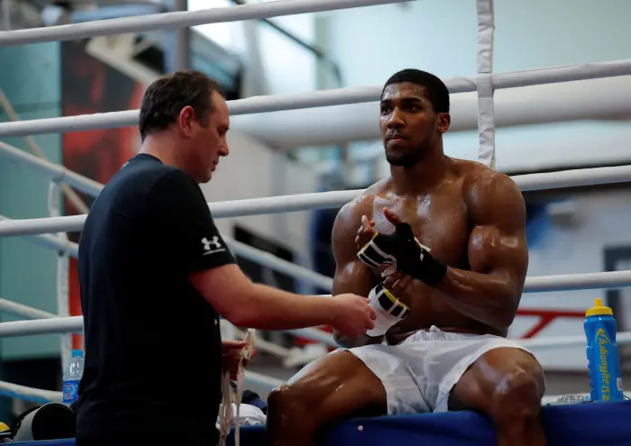 Boxing - Anthony Joshua Media Session - Sheffield, Britain - March 21, 2018   Anthony Joshua and trainer Robert McCracken during the media session