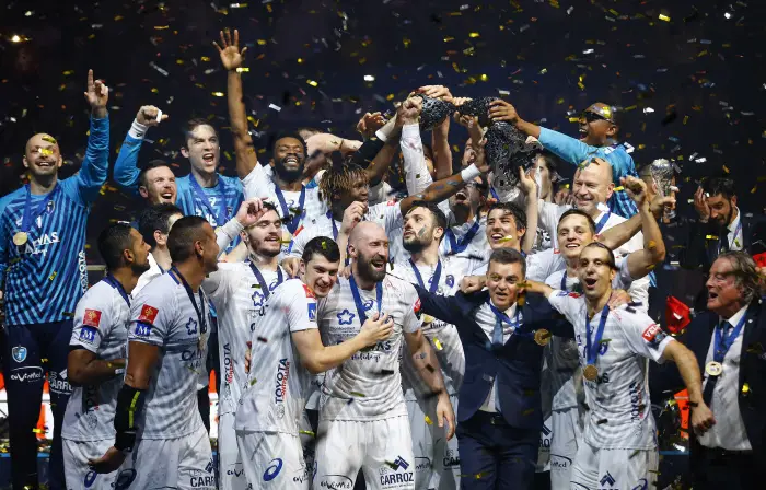 Handball - Men's EHF Champions League Final - HBC Nantes vs Montpellier HB - Lanxess Arena, Cologne, Germany - May 27, 2018. Montpellier HB players celebrate with the trophy.