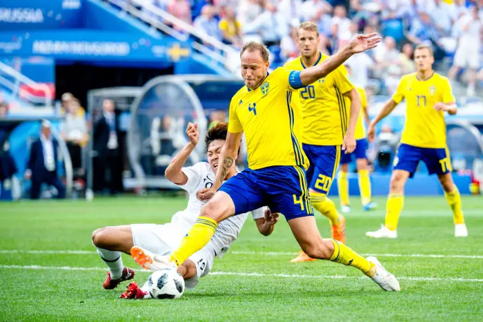 180618 Younggwon Kim or South Korea against Andreas Granqvist of Sweden during the FIFA World Cup group stage match between Sweden and South Korea on June 18, 2018 in Nizhny Novgorod