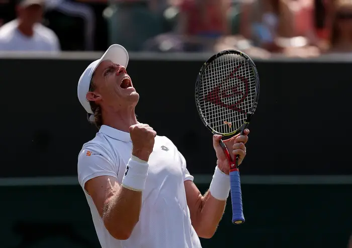 Tennis - Wimbledon - All England Lawn Tennis and Croquet Club, London, Britain - July 6, 2018  South Africa's Kevin Anderson celebrates winning the third round match against Germany's Philipp Kohlschreiber