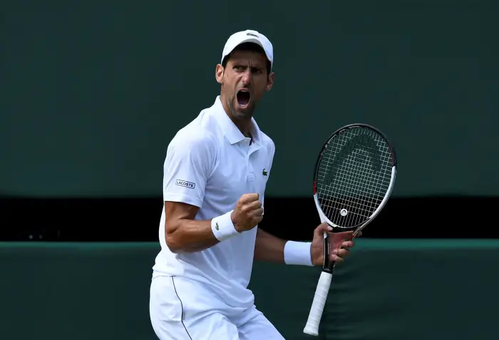 Tennis - Wimbledon - All England Lawn Tennis and Croquet Club, London, Britain - July 11, 2018  Serbia's Novak Djokovic celebrates