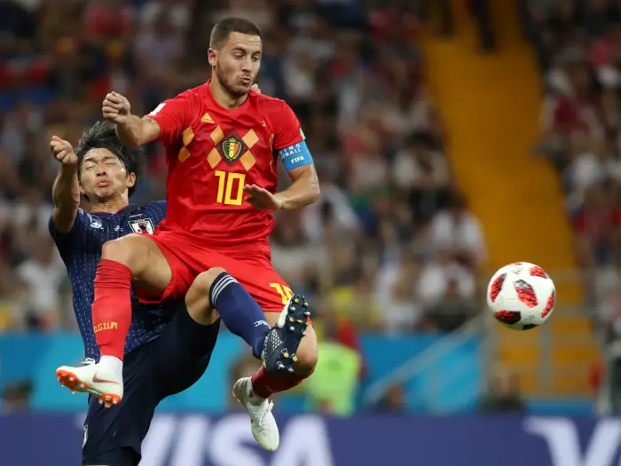 Belgium's Eden Hazard in action with Japan's Gaku Shibasaki