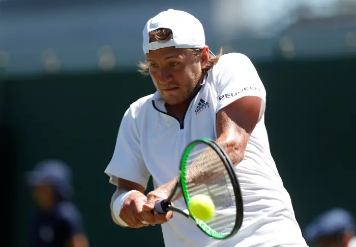 Tennis - Wimbledon - All England Lawn Tennis and Croquet Club, London, Britain - July 2, 2018  France's Lucas Pouille in action