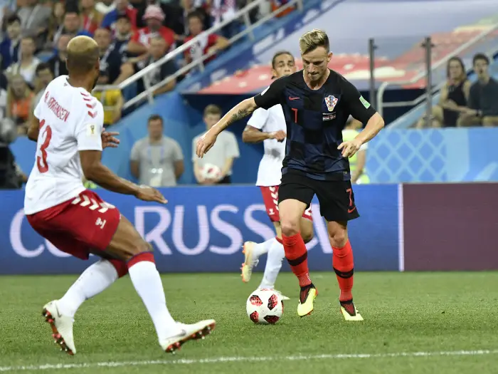 NIZHNY NOVGOROD, July 1, 2018  Ivan Rakitic (R) of Croatia controls the ball during the 2018 FIFA World Cup round of 16 match between Croatia and Denmark in Nizhny Novgorod, Russia, July 1, 2018