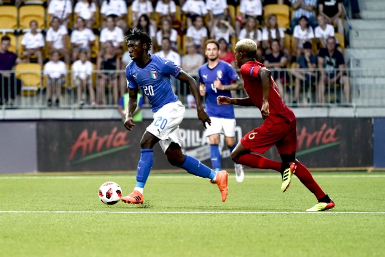 Italy's Moise Kean (L) and Portugal's Florentino vie for the ball during the 2018 UEFA European Under 19 Championship FIFA final football match between Italy vs Portugal in Seinajoki, Finland, on July 29, 2018.  / AFP PHOTO / Lehtikuva / Timo Aalto / Finland OUT