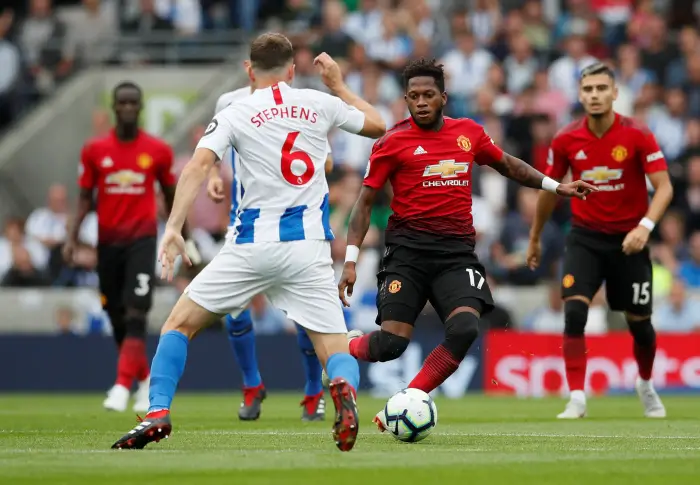 Soccer Football - Premier League - Brighton & Hove Albion v Manchester United - The American Express Community Stadium, Brighton, Britain - August 19, 2018  Manchester United's Fred in action with Brighton's Dale Stephens