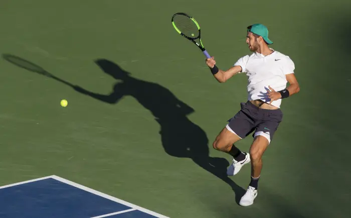 TORONTO, Aug. 11, 2018 Karen Khachanov of Russia returns the ball against Robin Haase of the Netherlands during the quarterfinal match of men's singles at the 2018 Rogers Cup in Toronto, Canada, Aug. 10, 2018. Karen Khachanov of Russia won 2-0.