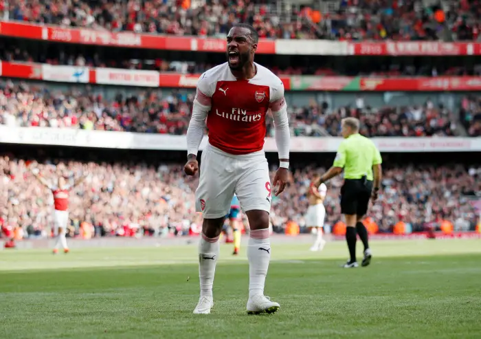 Soccer Football - Premier League - Arsenal v West Ham United - Emirates Stadium, London, Britain - August 25, 2018  Arsenal's Alexandre Lacazette celebrates their second goal after West Ham's Issa Diop scores an own goal