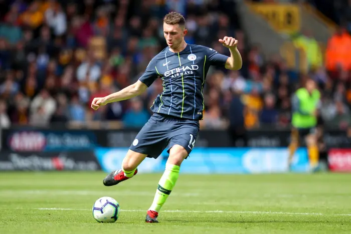 25th August 2018, Molineux, Wolverhampton, England; EPL Premier League football, Wolverhampton Wanderers versus Manchester City; Aymeric Laporte of Manchester City plays the ball forward