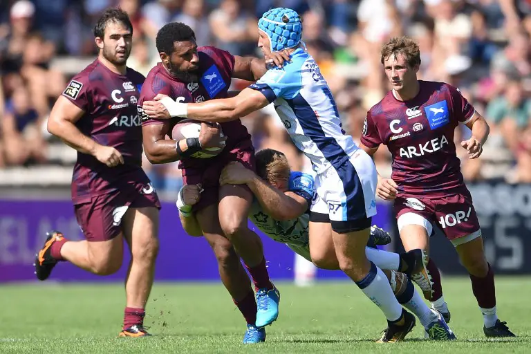 Bordeaux-Begles' New Zealander wing George Tilsley (2nd-L) vies with Montpellier's South African Johanes Goosen (2nd-R) during the French Top 14 rugby union match between Bordeaux-Begles and Montpellier on September 8, 2018 at the Chaban-Delmas stadium in Bordeaux, southwestern France.  / AFP PHOTO / NICOLAS TUCAT