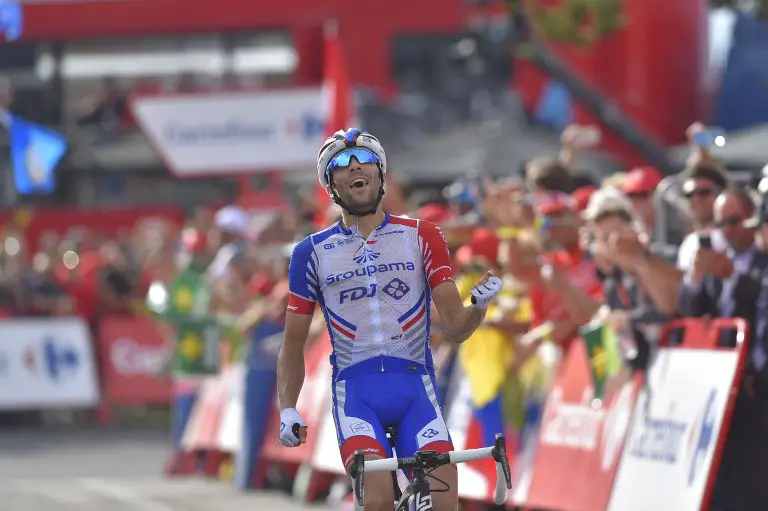 Groupama-FDJ's French cyclist Thibaut Pinot celebrates as he wins the 19th stage of the 73rd edition of "La Vuelta" Tour of Spain cycling race, a 154.4 km flat route from Lleida to La Rabassa in Andorra, on September 14, 2018. / AFP PHOTO / ANDER GILLENEA