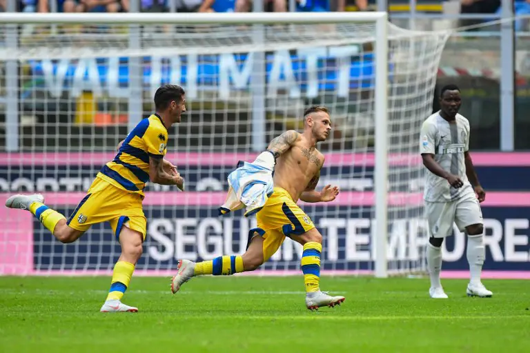 Parma's Italian defender Federico Dimarco (C) celebrates after opening the scoring during the Italian Serie A football match Inter Milan vs Parma on September 15, 2018 at the San Siro stadium in Milan. / AFP PHOTO / Miguel MEDINA