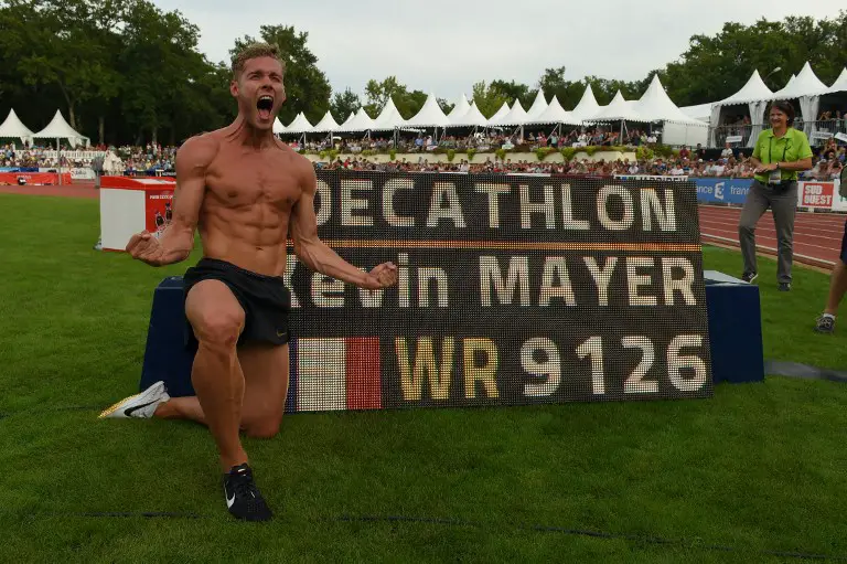 France's athlete Kevin Mayer reacts after setting a new world record in the decathlon during the IAAF 'Decastar' World Combined Events Challenge in Talence, south-western France on September 16, 2018. 
Kevin Mayer set a new world record in the decathlon with 9,126 points at the Decastar event on Sunday to eclipse the previous mark of 9,045 set by American Ashton Eaton. / AFP PHOTO / NICOLAS TUCAT