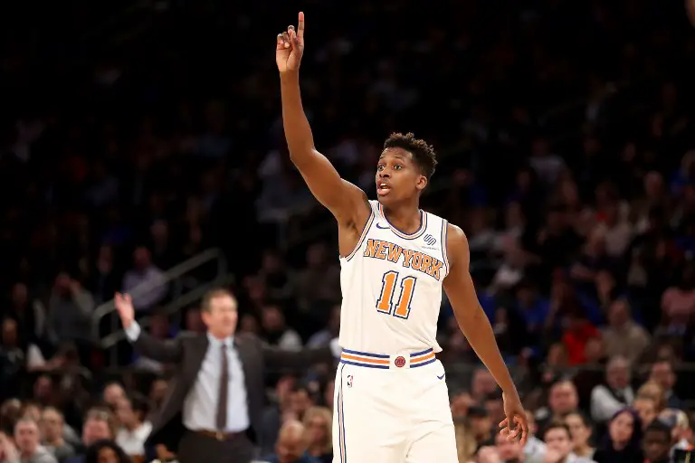 NEW YORK, NY - MARCH 23: Frank Ntilikina #11 of the New York Knicks reacts to a call in the third quarter against the Minnesota Timberwolves during their game at Madison Square Garden on March 23, 2018 in New York City. NOTE TO USER: User expressly acknowledges and agrees that, by downloading and or using this photograph, User is consenting to the terms and conditions of the Getty Images License Agreement.   Abbie Parr/Getty Images/AFP