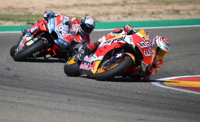 Repsol Honda's Marc Marquez in action with Ducati's Andrea Dovizioso during the race
