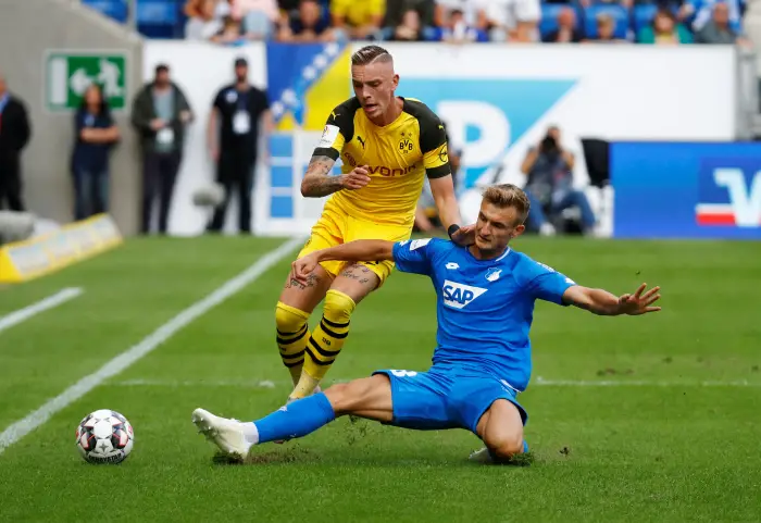 Borussia Dortmund's Marius Wolf in action with Hoffenheim's Stefan Posch