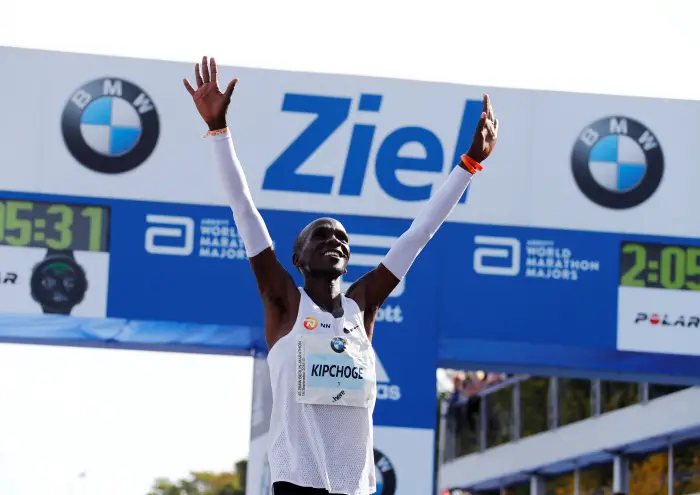 Athletics - Berlin Marathon - Berlin, Germany - September 16, 2018   Kenya's Eliud Kipchoge celebrates winning the Berlin Marathon and breaking World Record