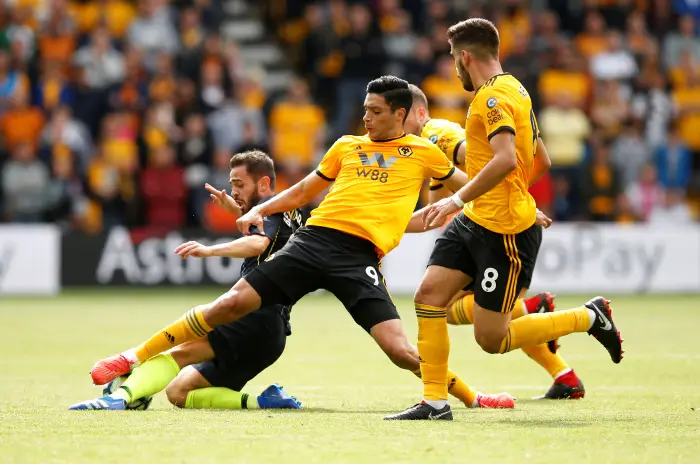 Soccer Football - Premier League - Wolverhampton Wanderers v Manchester City - Molineux Stadium, Wolverhampton, Britain - August 25, 2018  Manchester City's Bernardo Silva  in action with Wolverhampton Wanderers' Raul Jimenez