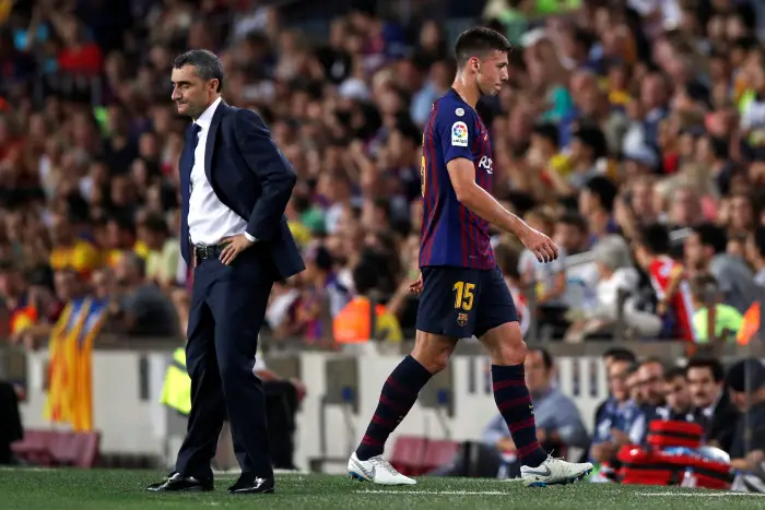 Barcelona's Clement Lenglet walks past coach Ernesto Valverde after being sent off by referee Jesus Manzano