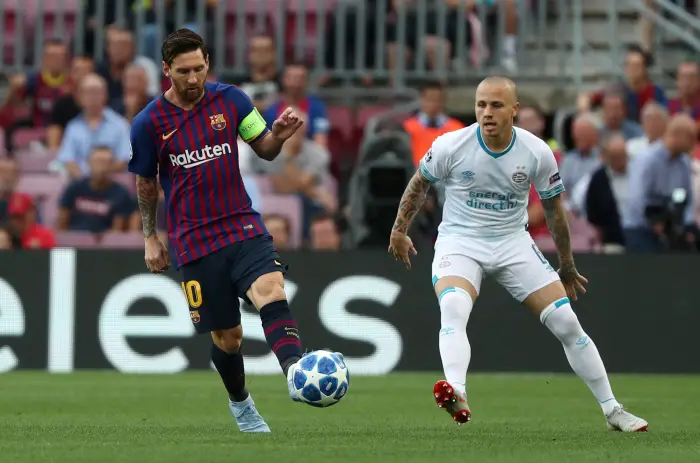 Soccer Football - Champions League - Group Stage - Group B - FC Barcelona v PSV Eindhoven - Camp Nou, Barcelona, Spain - September 18, 2018  Barcelona's Lionel Messi in action with PSV Eindhoven's Angelino