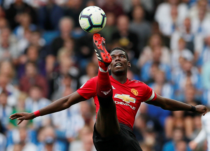 Soccer Football - Premier League - Brighton & Hove Albion v Manchester United - The American Express Community Stadium, Brighton, Britain - August 19, 2018   Manchester United's Paul Pogba in action