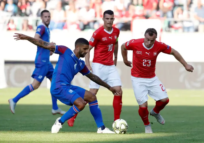 Soccer Football - UEFA Nations League - League A - Group 2 - Switzerland v Iceland - Kybunpark, St. Gallen, Switzerland - September 8, 2018  Iceland's Victor Palsson in action with Switzerland's Xherdan Shaqiri