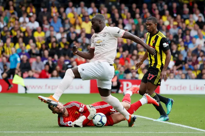 Soccer Football - Premier League - Watford v Manchester United - Vicarage Road, Watford, Britain - September 15, 2018  Manchester United's Romelu Lukaku in action with Watford's Ben Foster